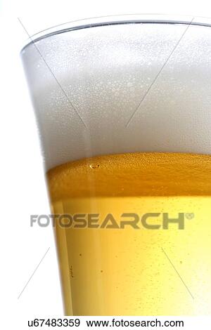 Pitcher of beer - close-up View Large Photo Image Stock Photo - Pitcher of beer - close-up. Fotosearch