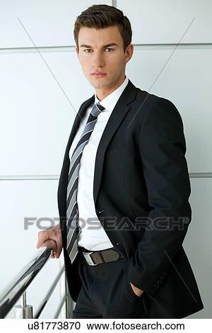 Portrait of businessman with hands in pockets View Large Photo Image Stock Image - Portrait of businessman with hands in pockets. Fotosearch