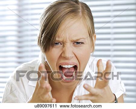 Portrait of businesswoman shouting View Large Photo Image Stock Image - Portrait of businesswoman shouting. Fotosearch