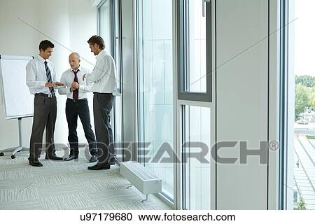 Portrait of young caucasian business people in office View Large Photo Image Stock Image - Portrait of young caucasian business people in office. Fotosearch