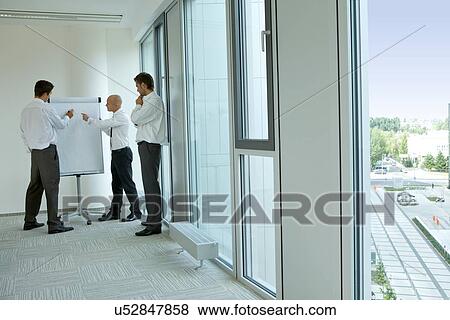 Portrait of young caucasian business people in office View Large Photo Image Stock Photo - Portrait of young caucasian business people in office. Fotosearch