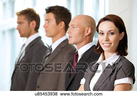 Portrait of young caucasian business people in office View Large Photo Image Stock Photo - Portrait of young caucasian business people in office. Fotosearch