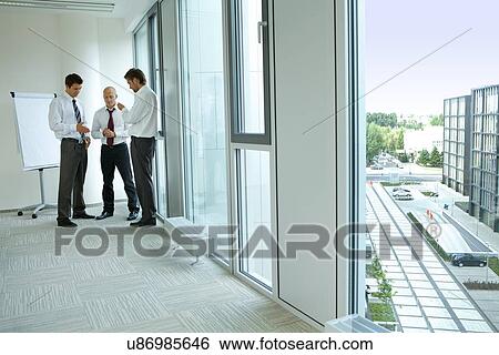 Portrait of young caucasian business people in office View Large Photo Image Stock Photograph - Portrait of young caucasian business people in office. Fotosearch