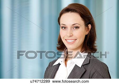 Portrait of young caucasian businesswoman in office View Large Photo Image Stock Photo - Portrait of young caucasian businesswoman in office. Fotosearch