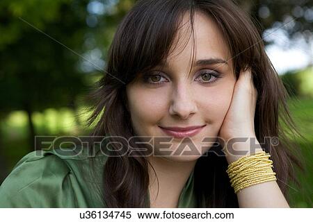Portrait of young woman smiling View Large Photo Image Stock Photography - Portrait of young woman smiling. Fotosearch