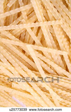 Stock Photo - Raw pasta on white background. Fotosearch