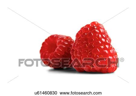 Stock Image - Red raspberries on white backgroud. Fotosearch