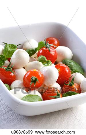 Stock Photo - Salad with tomatoes and mozarella. Fotosearch