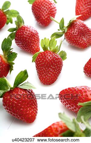 Stock Photo - Strawbwrry on white background - close-up. Fotosearch