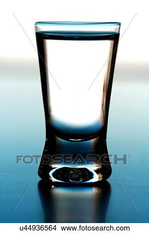 Picture - Studio shot of glass with vodka. Fotosearch