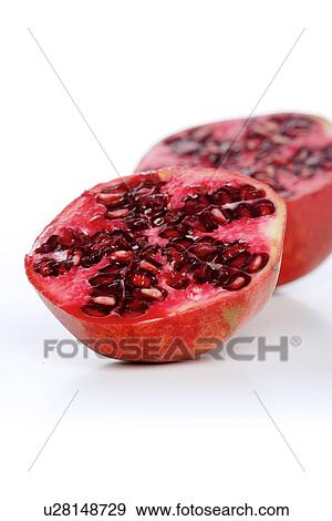 Stock Photo - Studio shot of pomegranate fruit. Fotosearch