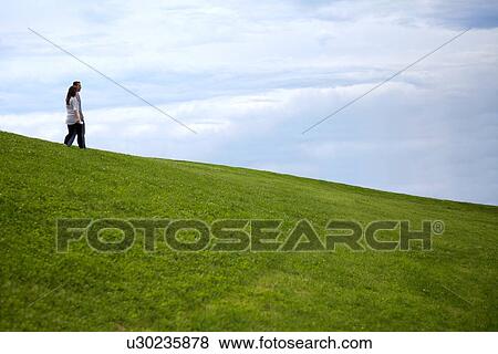 View of young couple looking at each other View Large Photo Image Stock Photo - View of young couple looking at each other. Fotosearch