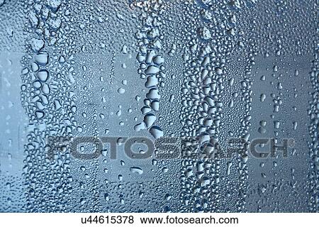 Water drops on window - close up View Large Photo Image Stock Photo - Water drops on window - close up. Fotosearch