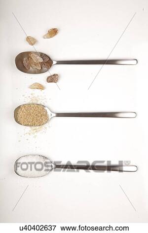 White and brown sugar on spoons View Large Photo Image Stock Photo - White and brown sugar on spoons. Fotosearch