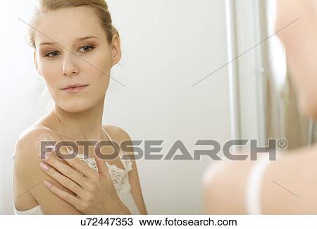 Woman reflaction in mirror View Large Photo Image Stock Image - Woman reflaction in mirror. Fotosearch