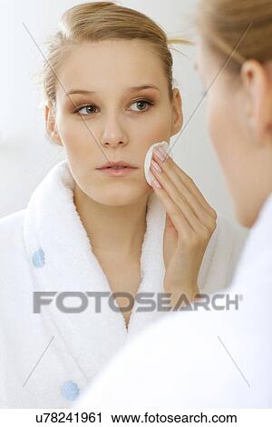Woman using dabber, portrait, close-up View Large Photo Image Stock Image - Woman using dabber, portrait, close-up. Fotosearch