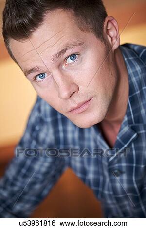 Stock Photograph - Young man. Fotosearch