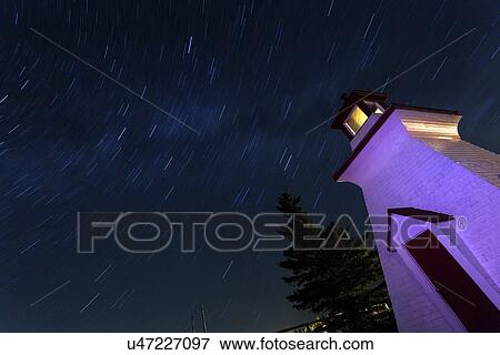 Stock Photo - Anderson Hollow Lighthouse and sky shot with long exposure. Fotosearch