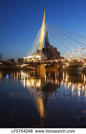 Stock Photo - Canadian Museum for Human Rights and Esplanade Riel bridge. Fotosearch