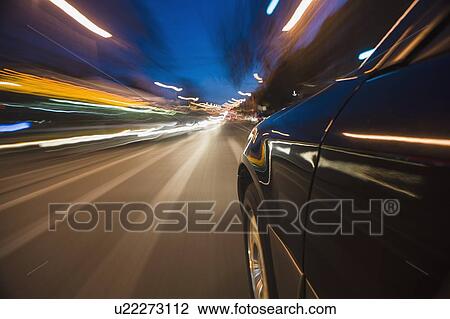 Car speeding through street View Large Photo Image Stock Image - Car speeding through street. Fotosearch