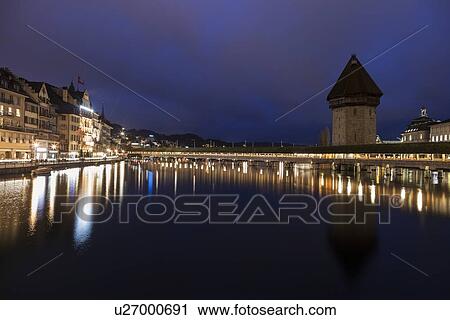 Stock Image - Chapel Bridge at night . Fotosearch