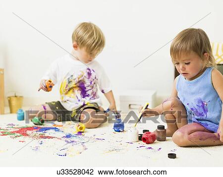 Children (2-3) painting on carpet View Large Photo Image Stock Image - Children (2-3) painting on carpet. Fotosearch