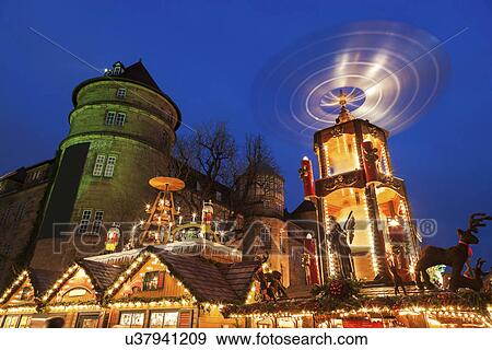 Stock Photo - Christmas market at night. Fotosearch