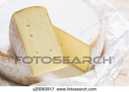 Stock Photo - Close up of cheese circle. Fotosearch