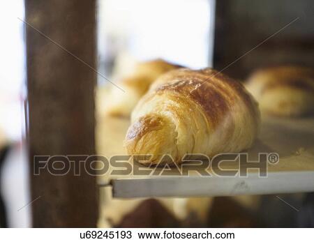 Stock Image - Close-up of croissant in bakery. Fotosearch