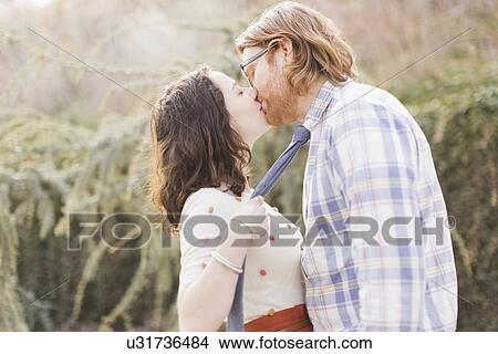 Couple kissing View Large Photo Image Picture - Couple kissing. Fotosearch