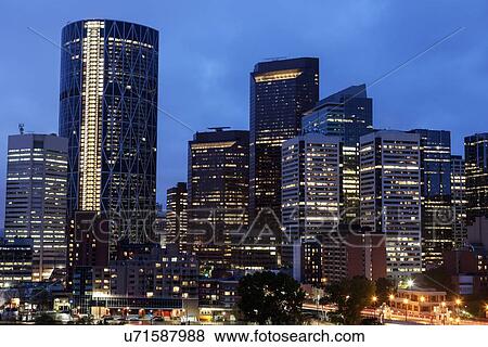 Downtown district at night View Large Photo Image Stock Photo - Downtown district at night . Fotosearch