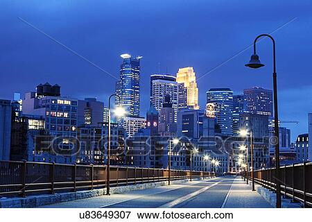 Stock Photo - Downtown district at night. Fotosearch