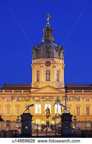 Stock Photo - Facade and entrance at night. Fotosearch
