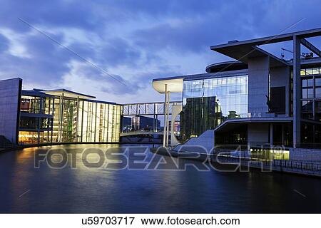 Federal Parliament offices illuminated at dusk View Large Photo Image Stock Photo - Federal Parliament offices illuminated at dusk. Fotosearch