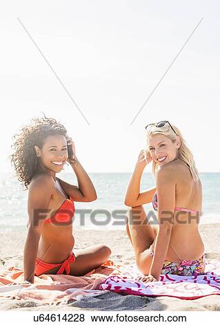 Female friends on beach View Large Photo Image Stock Photo - Female friends on beach . Fotosearch