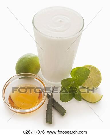 Honey, lime and mint smoothie View Large Photo Image Stock Photograph - Honey, lime and mint smoothie. Fotosearch