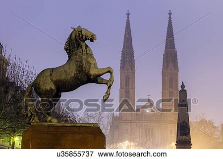 Horse sculpture of Waterloo Memorial and St. Boniface Church in mist View Large Photo Image Stock Photo - Horse sculpture of Waterloo Memorial and St. Boniface Church in mist . Fotosearch