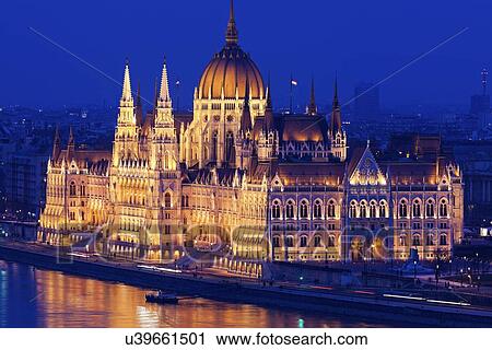 Stock Image - Hungarian Parliament illuminated at night. Fotosearch