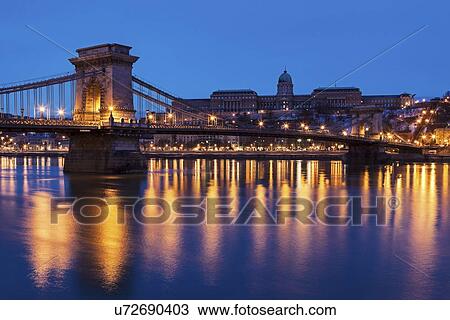Illuminated Chain Bridge and Buda skyline View Large Photo Image Stock Image - Illuminated Chain Bridge and Buda skyline. Fotosearch