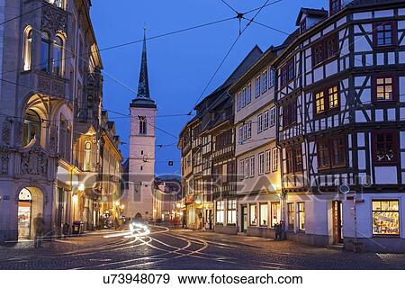 Illuminated city street and Allerheiligenkirche bell tower View Large Photo Image Stock Photo - Illuminated city street and Allerheiligenkirche bell tower. Fotosearch