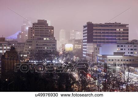 Illuminated cityscape in fog View Large Photo Image Stock Image - Illuminated cityscape in fog. Fotosearch