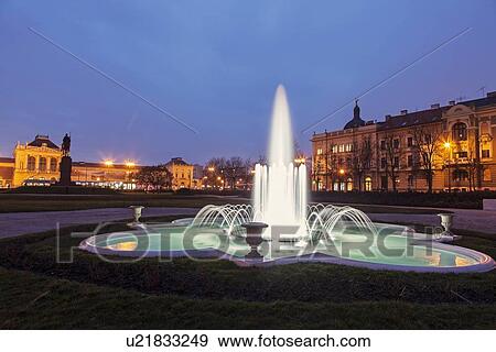 Illuminated fountain at night View Large Photo Image Stock Photo - Illuminated fountain at night. Fotosearch