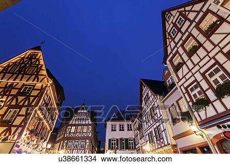 Illuminated half-timbered houses View Large Photo Image Picture - Illuminated half-timbered houses. Fotosearch