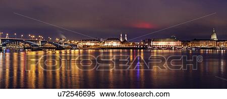 Illuminated waterfront skyline View Large Photo Image Stock Photography - Illuminated waterfront skyline. Fotosearch