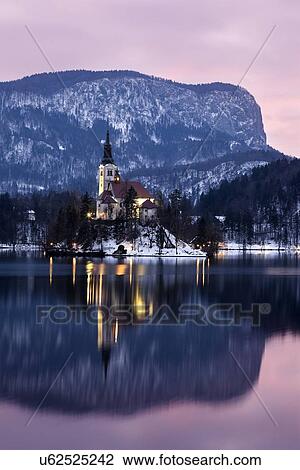 Lake Bled and illuminated Church of the Assumption View Large Photo Image Stock Image - Lake Bled and illuminated Church of the Assumption. Fotosearch