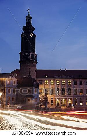 Light trails and clock tower at night View Large Photo Image Picture - Light trails and clock tower at night. Fotosearch