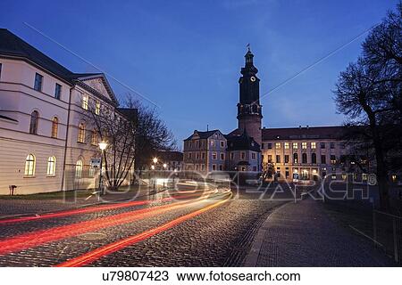 Light trails in old town street View Large Photo Image Stock Image - Light trails in old town street. Fotosearch