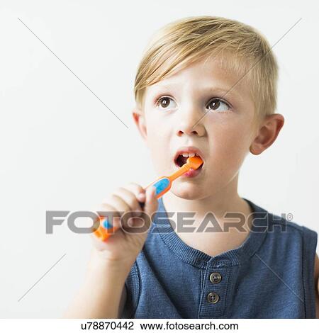Little boy (2-3) brushing teeth View Large Photo Image Stock Image - Little boy (2-3) brushing teeth. Fotosearch