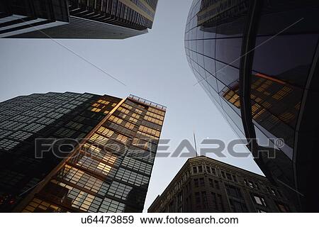 Stock Photo - Low-angle view of downtown district. Fotosearch