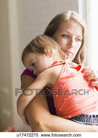 Mather carrying daughter (2-3) View Large Photo Image Stock Photography - Mather carrying daughter (2-3). Fotosearch